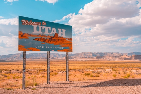 A sign says, "Welcome to Utah"