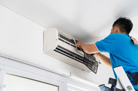 An AC is being repaired