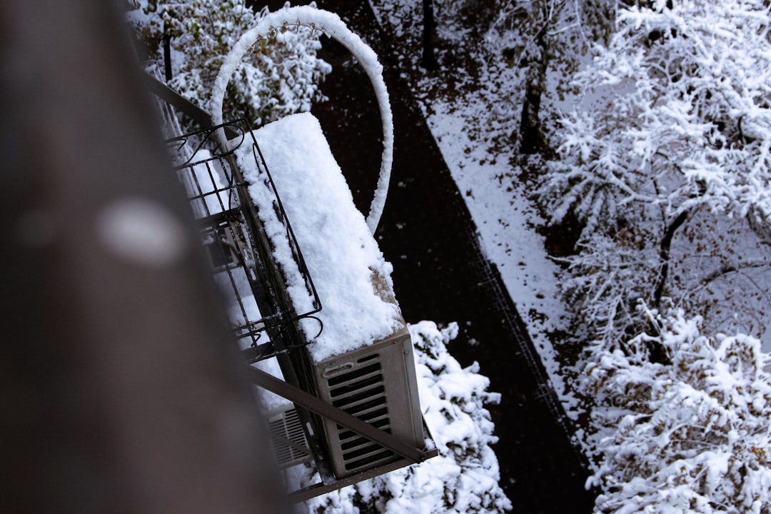 heat pump operating in winter snow in Salt Lake Valley