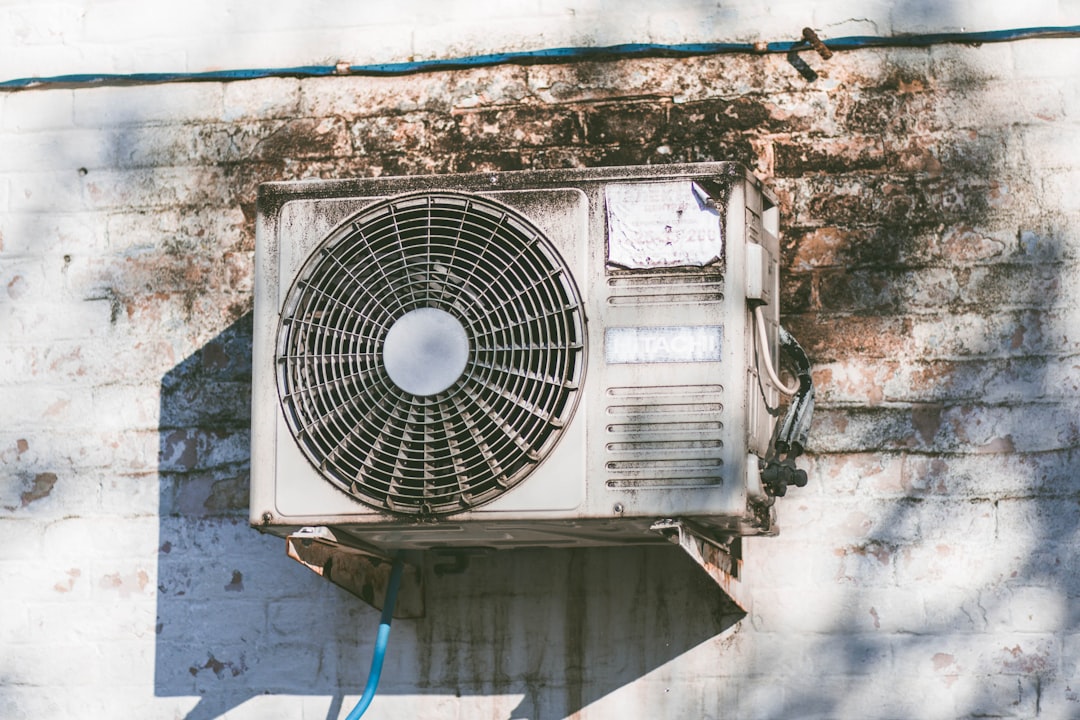 average lifespan of a central air conditioner in a hot dry utah climate