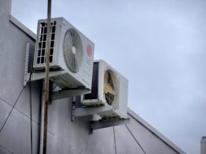 AC unit outside a home in Salt Lake Valley during hot summer